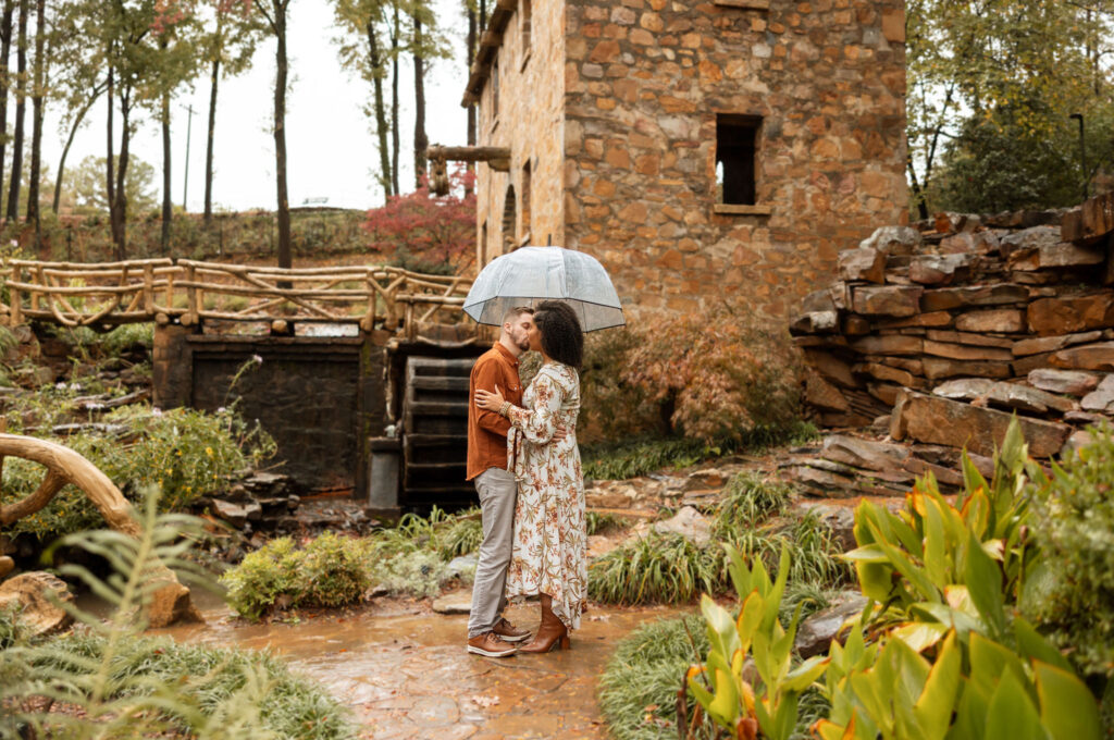 surprise engagement photos in little rock arkansas in the rain