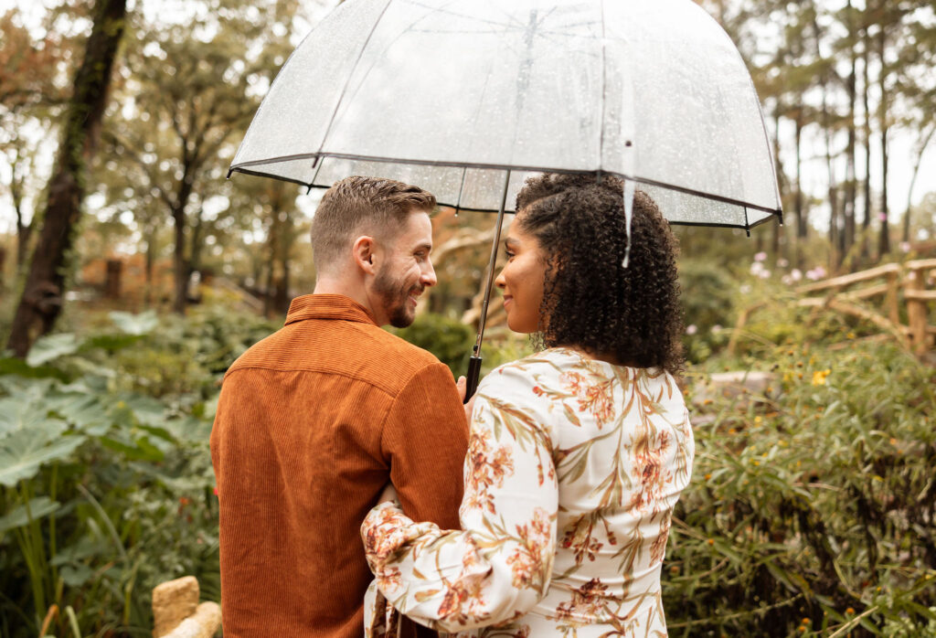 surprise engagement photos in little rock arkansas in the rain