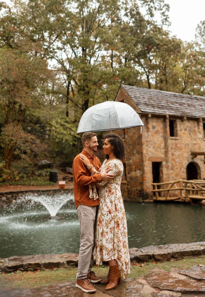 documentary style engagement photos in the rain