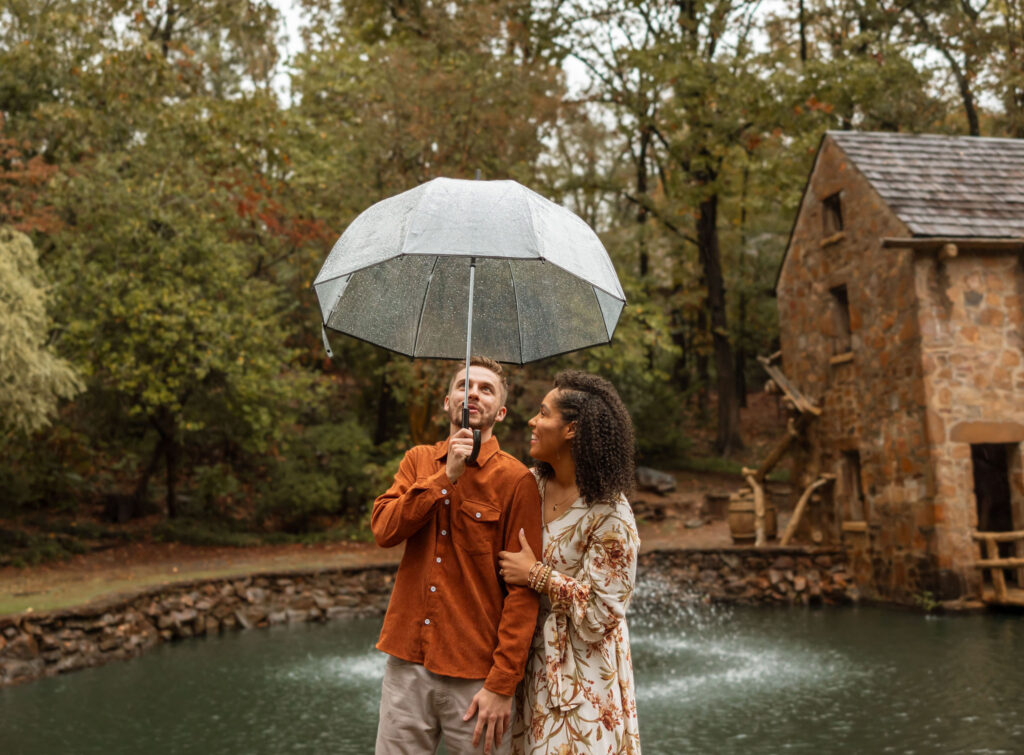 documentary style engagement photos in the rain