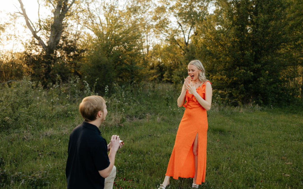 guy getting on one knee surprise proposal photos