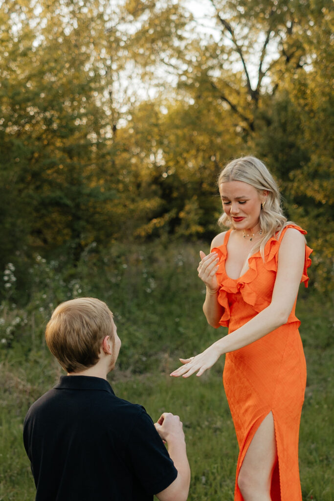 guy getting on one knee surprise proposal photos