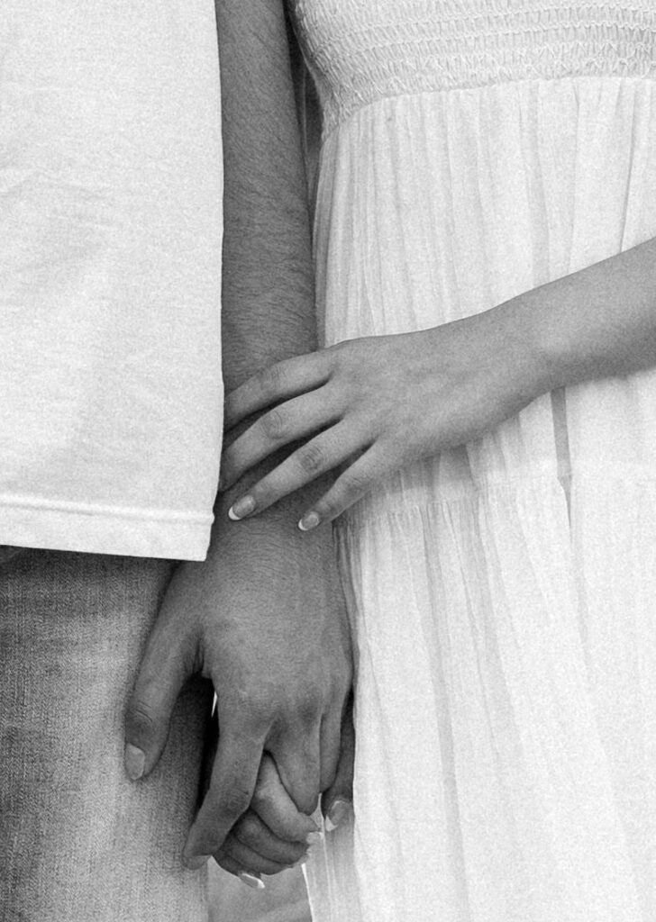 couple holding hands detail engagement photos