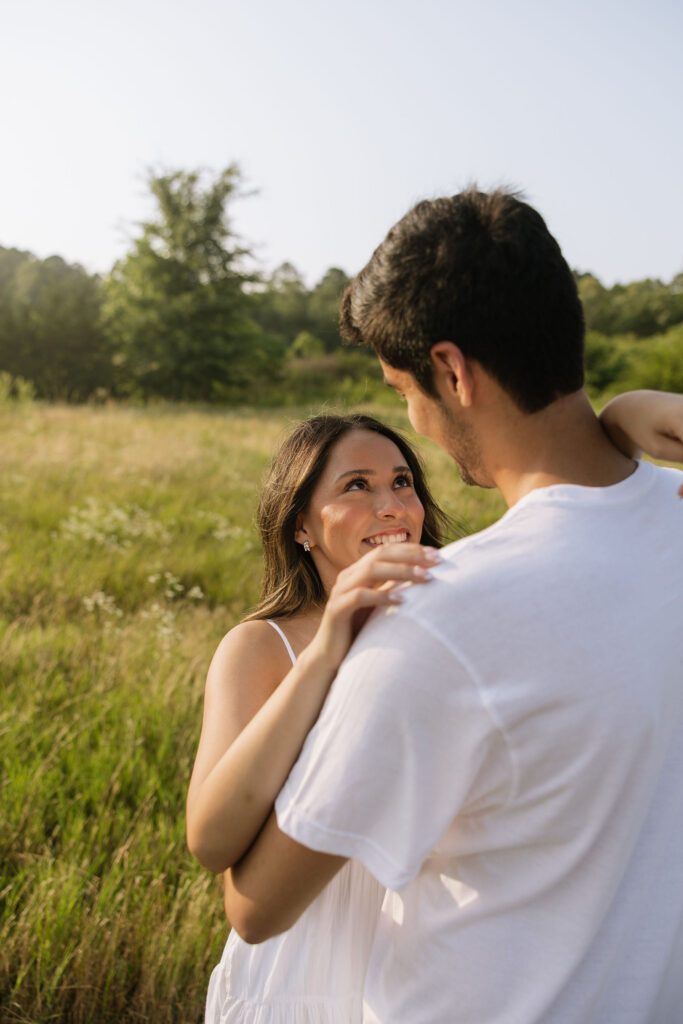 spring couples photoshoot in a field