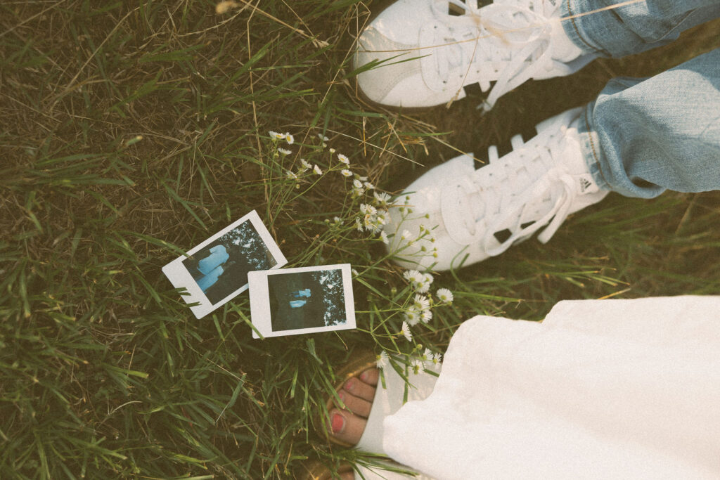 polaroid couples photoshoot outdoors in a field