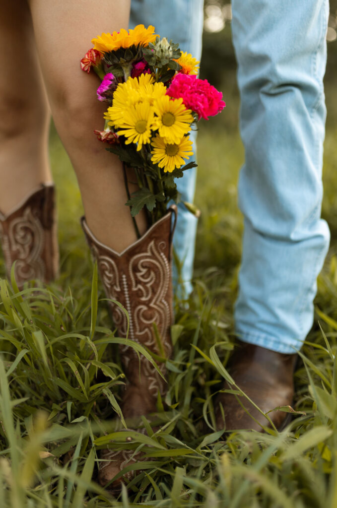 golden hour arkansas engagement photos with cowboy boots