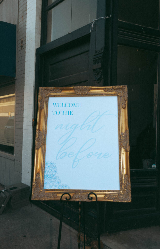 wedding signage with gold frame outside wedding venue