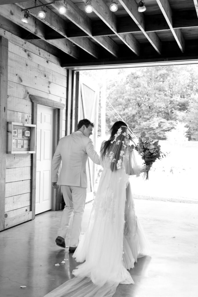 bride and groom celebrating first kiss at wedding ceremony