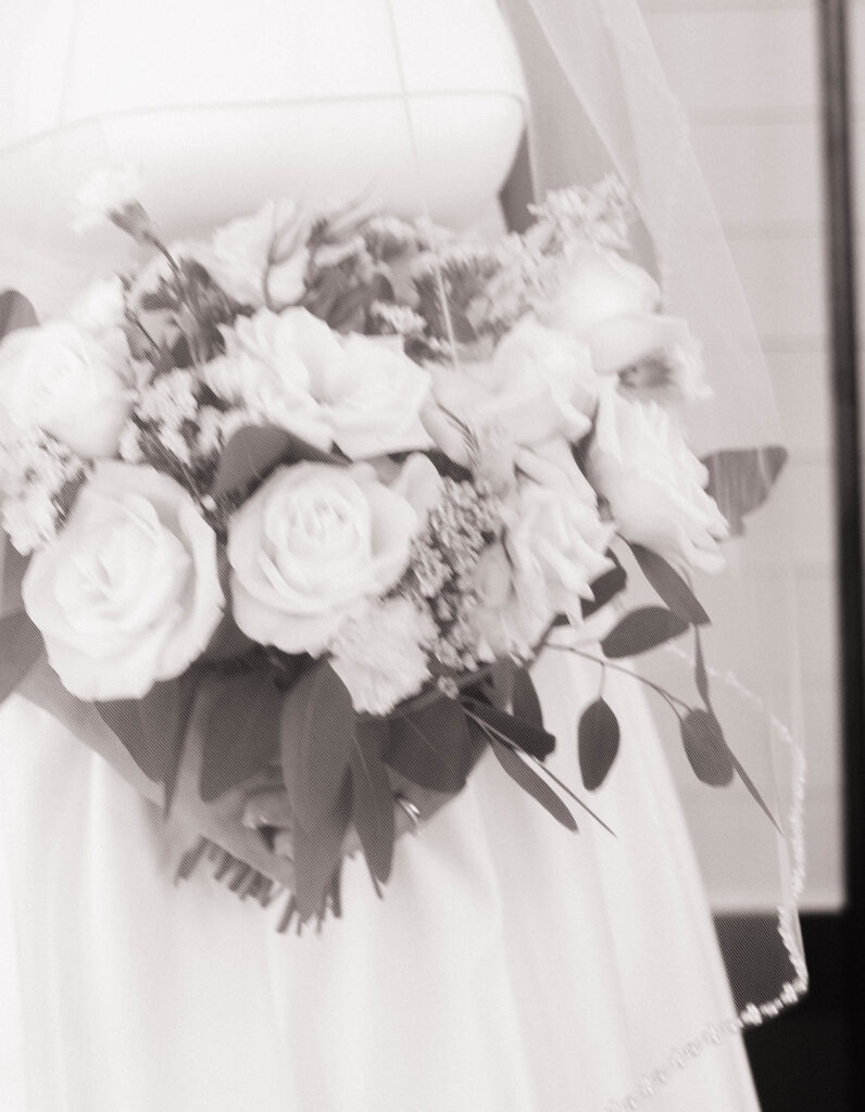 bridal portraits with bride and groom wedding arch with flowers