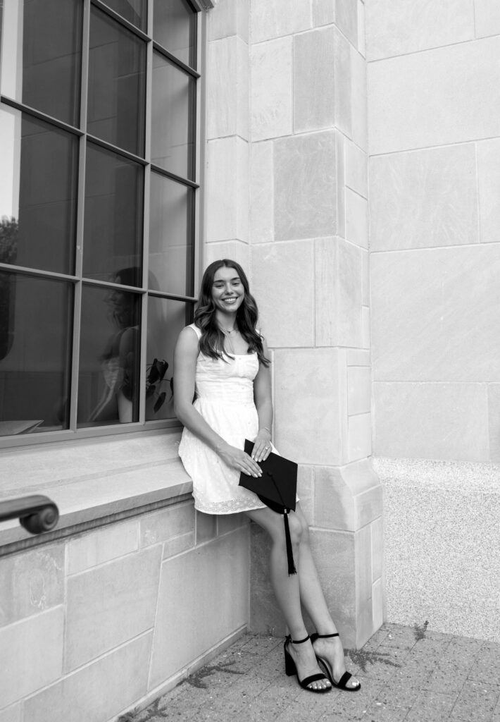 girl posing for senior session at UARK