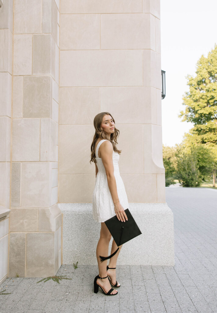 girl posing for senior session at UARK